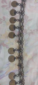 سکه ۵ دیناری ۱۳۱۷ آوریز شده